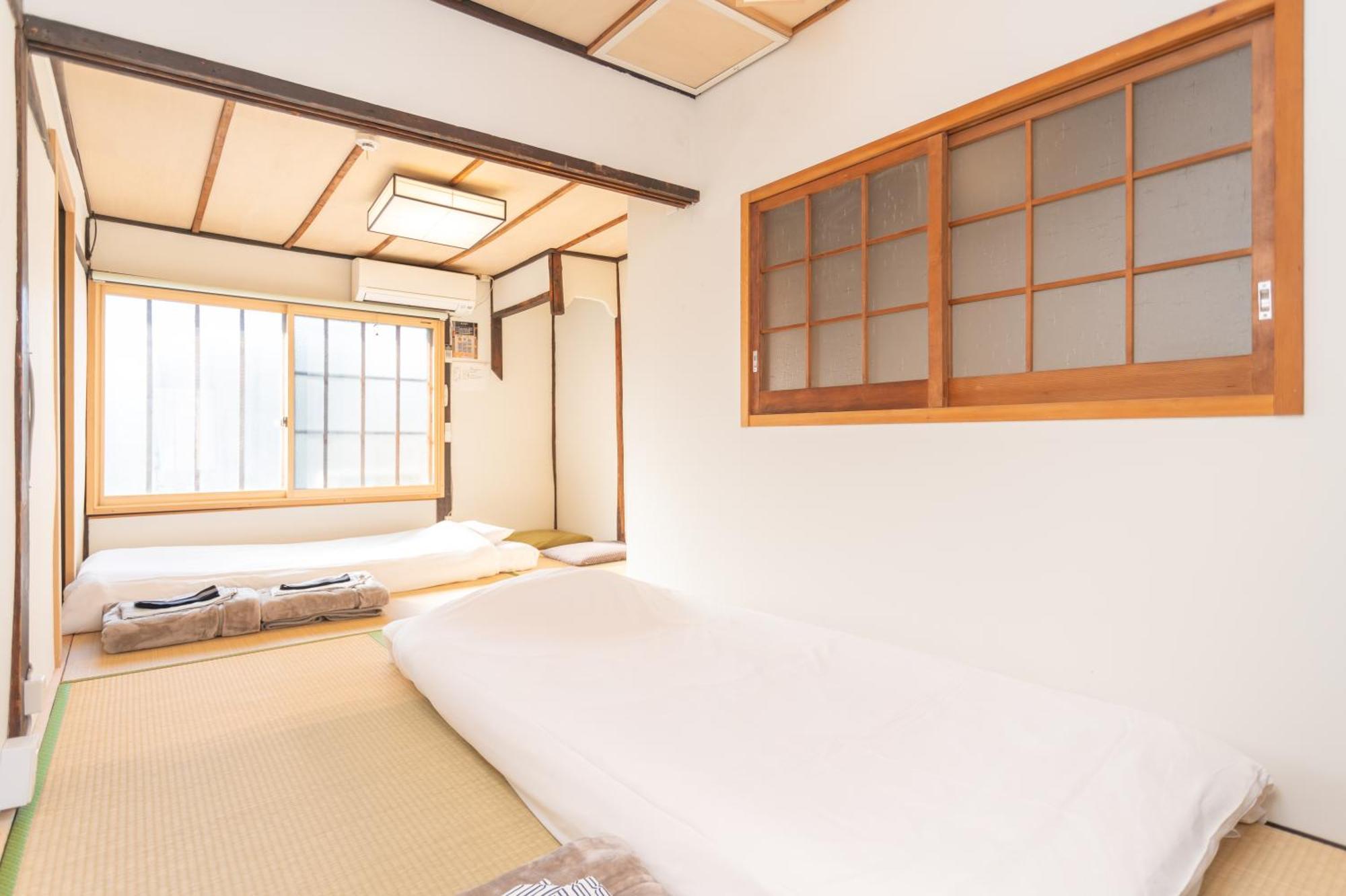Guesthouse Oneworld Shijo四条京町屋 Киото Экстерьер фото