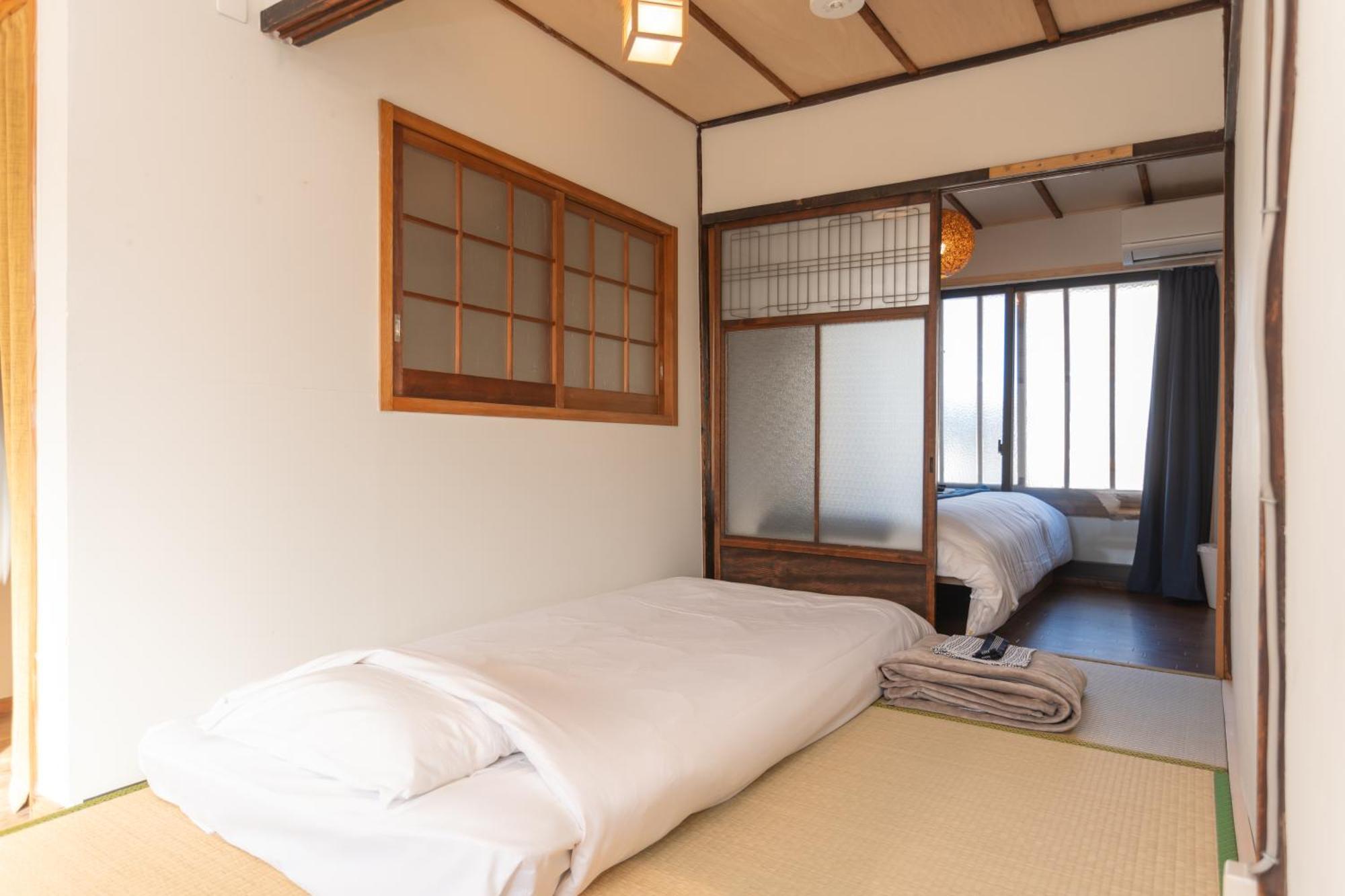 Guesthouse Oneworld Shijo四条京町屋 Киото Экстерьер фото